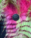 Close-up of a pink and green plush fake fur coat with a black SpiritHoods winged logo button featuring a logo.