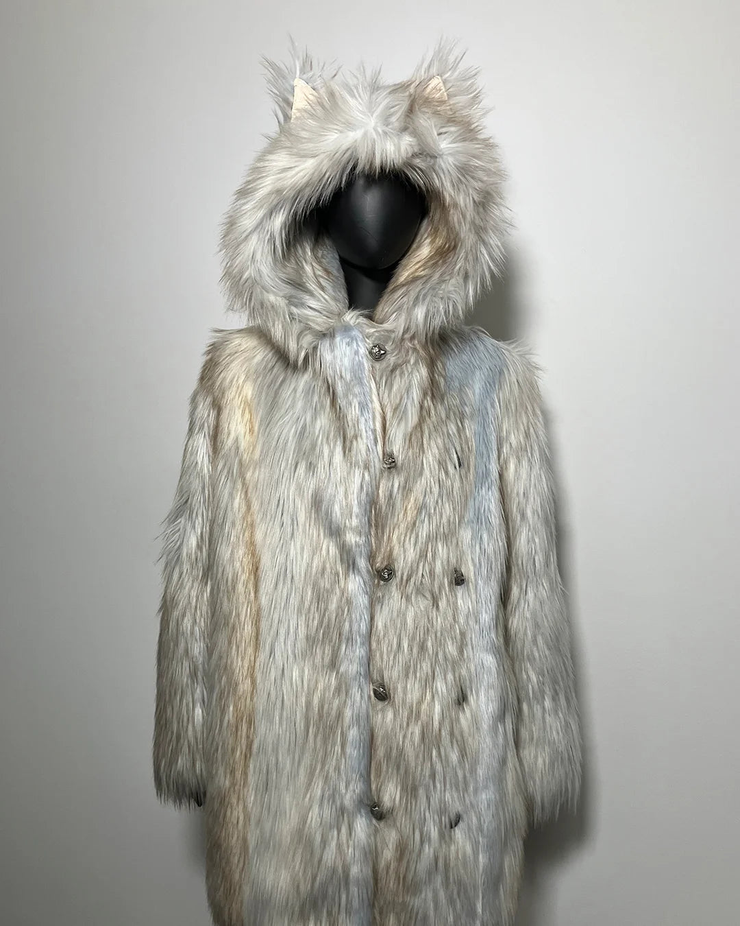 Faux Fur coat with hood on a gray background