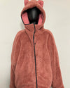 A plush teddy fleece zip-up hooded jacket with cat ears on the hood, displayed on a black mannequin against a plain off-white background.