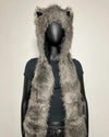 A gray faux fur hooded vest with long ears, displayed on a black mannequin torso against a plain off-white background.