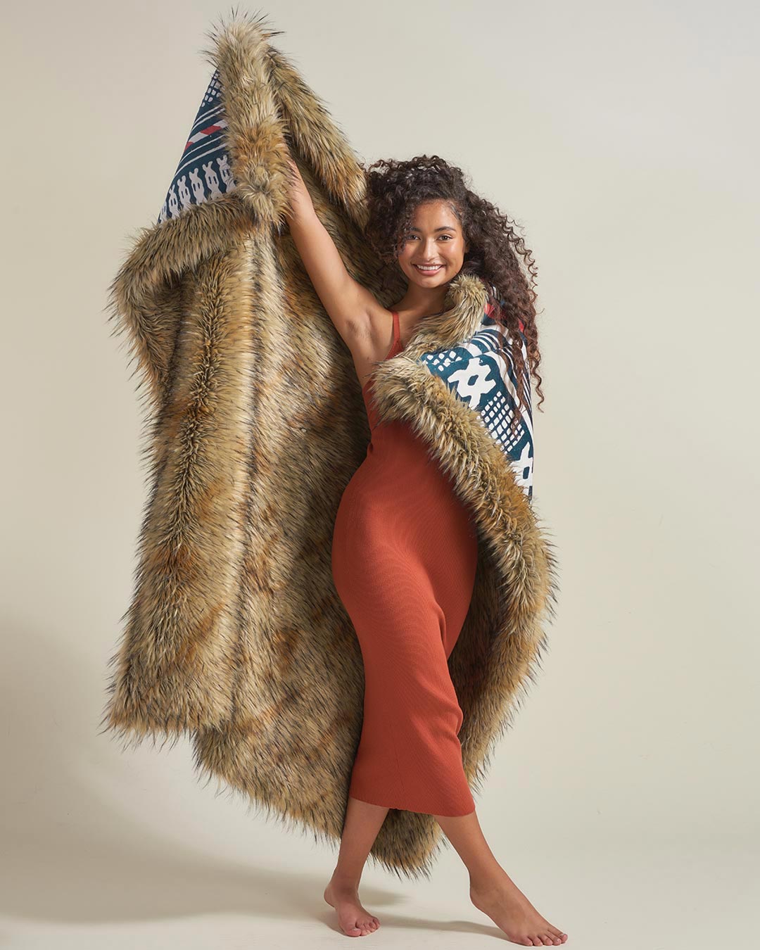 Woman Holding Golden Jackal Collector Edition Faux Fur Throw