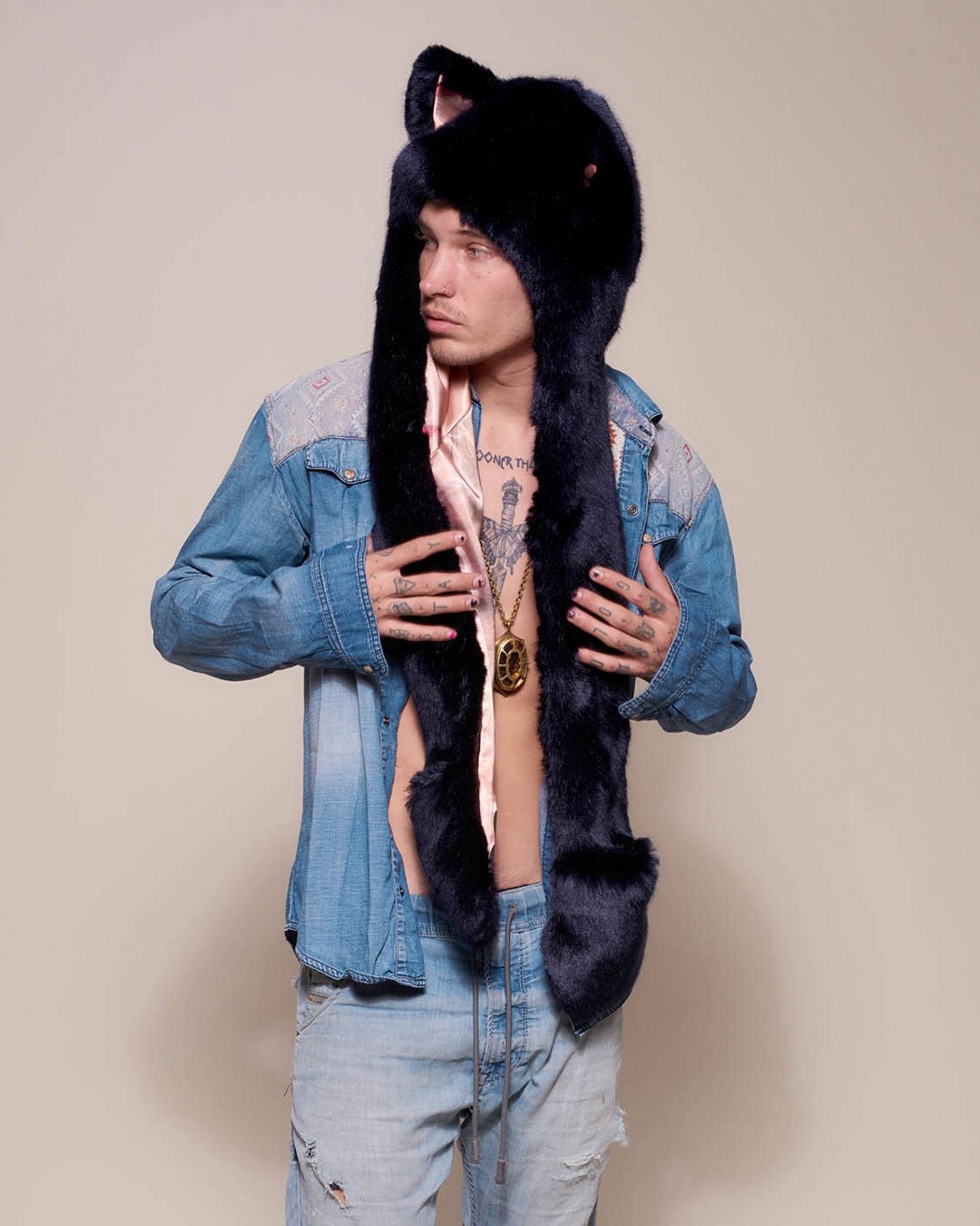 Man wearing Indigo Wolf Luxe Collector Edition Faux Fur Hood, side view