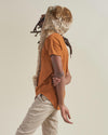 Man wearing African Golden Cat Luxe Faux Fur Collector Edition Hood, side view 1
