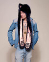 Man wearing Indigo Wolf Luxe Collector Edition Faux Fur Hood, side view 1