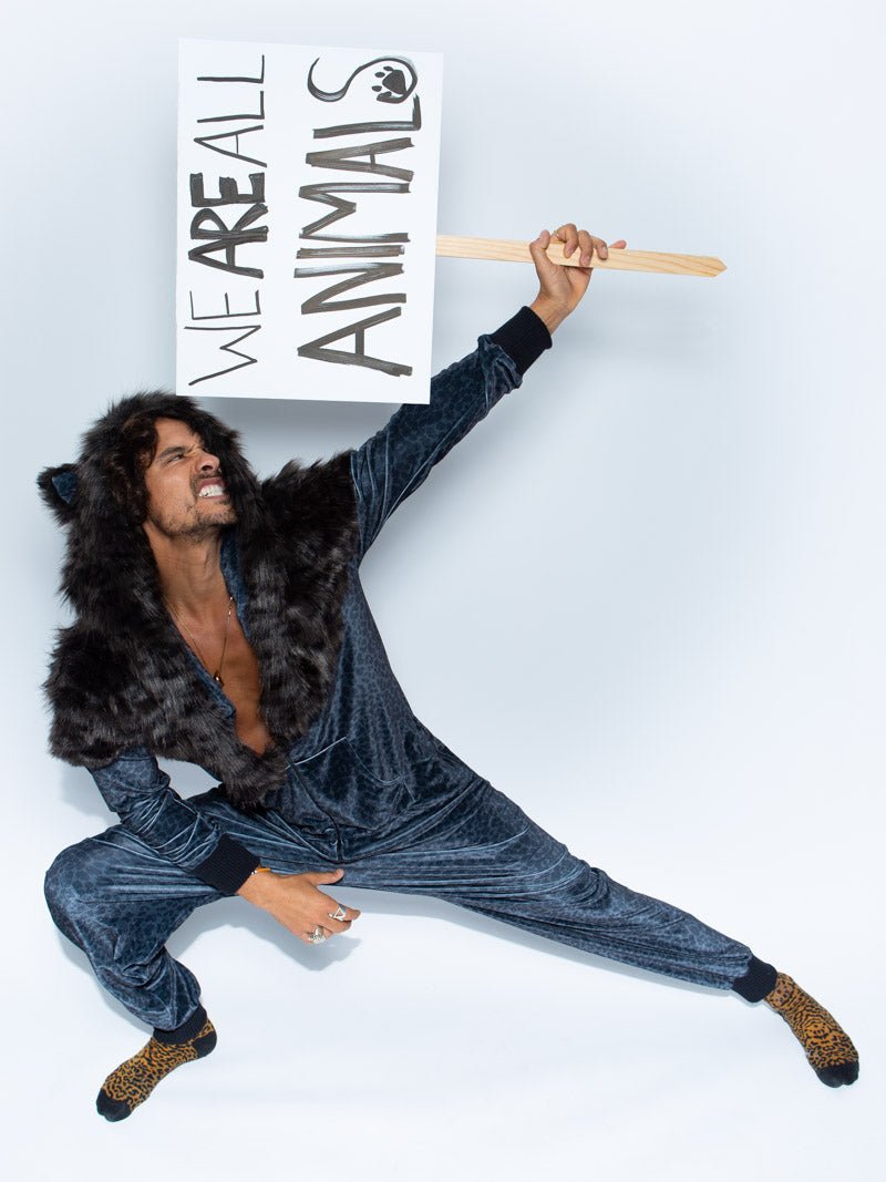 Man wearing Black Panther Faux Fur Velvet Onesie, side view 1