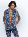 Man wearing faux fur Sacred Sailor Cat Collector SpiritHood, front view 1