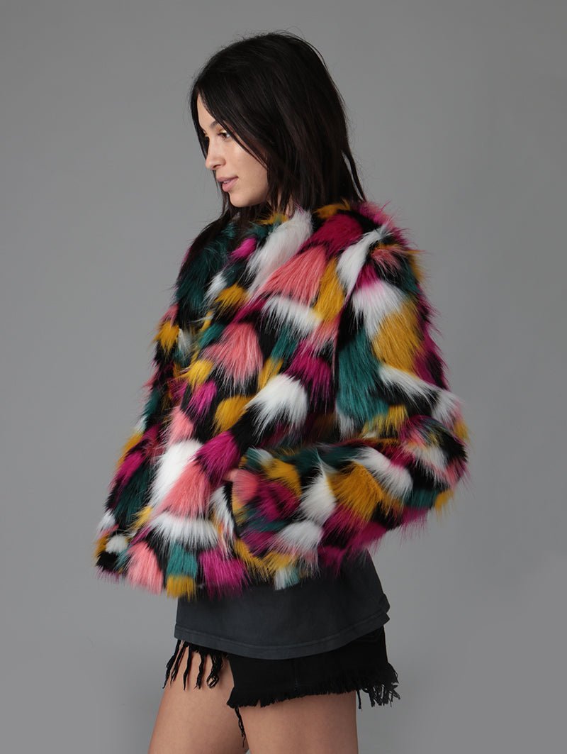 Woman wearing faux fur Butterfly Bomber Limited Edition coat, side view 1