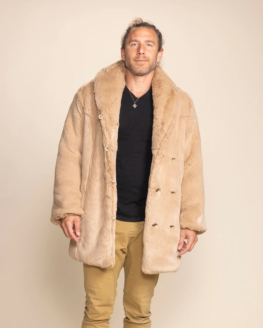 Animal-inspired winter coat for men in Cougar tan, featuring a versatile collar worn up or down, high-quality vegan fur.