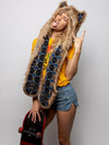Woman wearing faux fur Collector Edition Coyote SpiritHood, side view