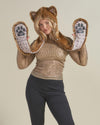 Woman wearing faux fur Coyote Dia De Los Muertos Luxe CE Hood, front view 2