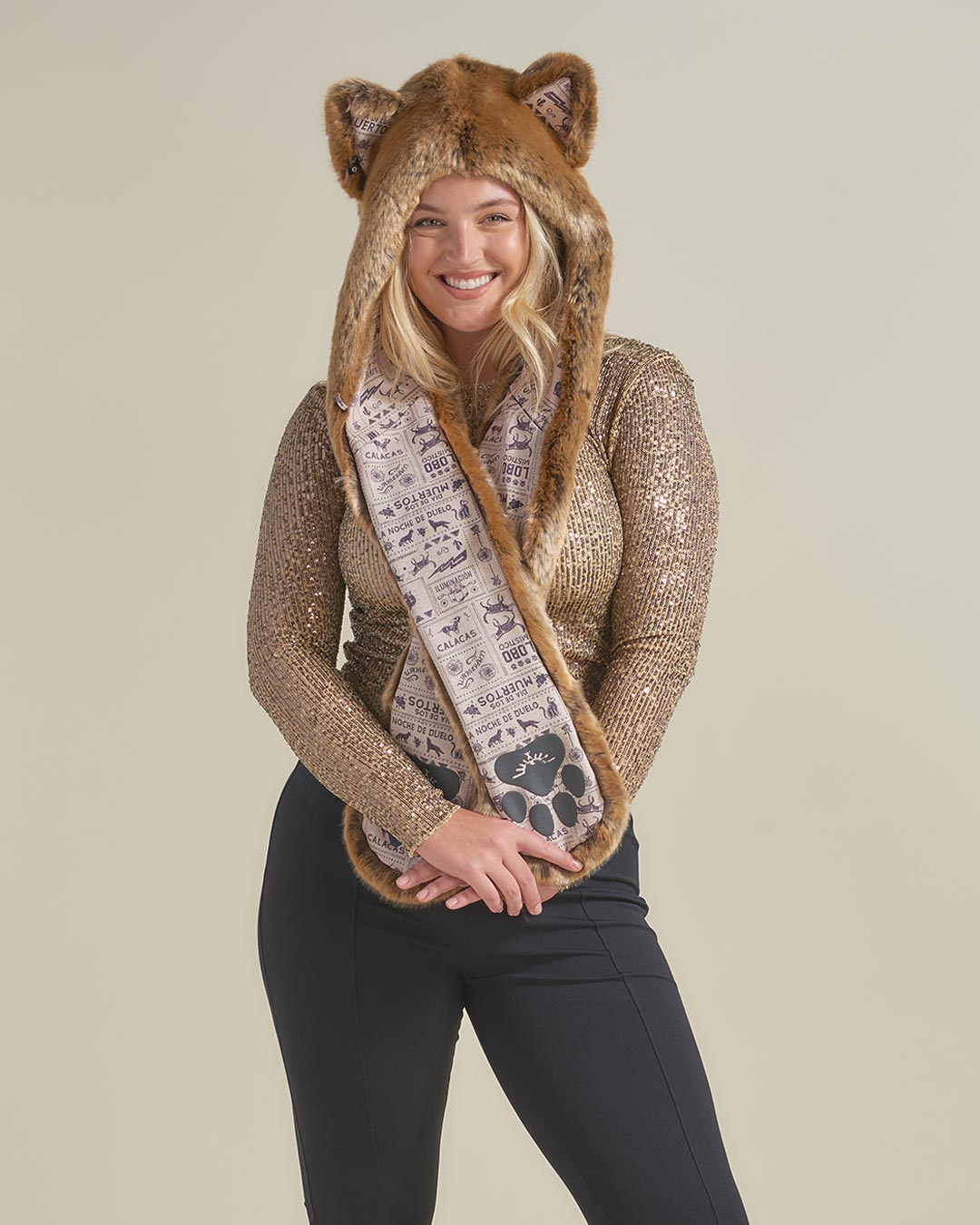 Woman wearing faux fur Coyote Dia De Los Muertos Luxe CE Hood, front view 1