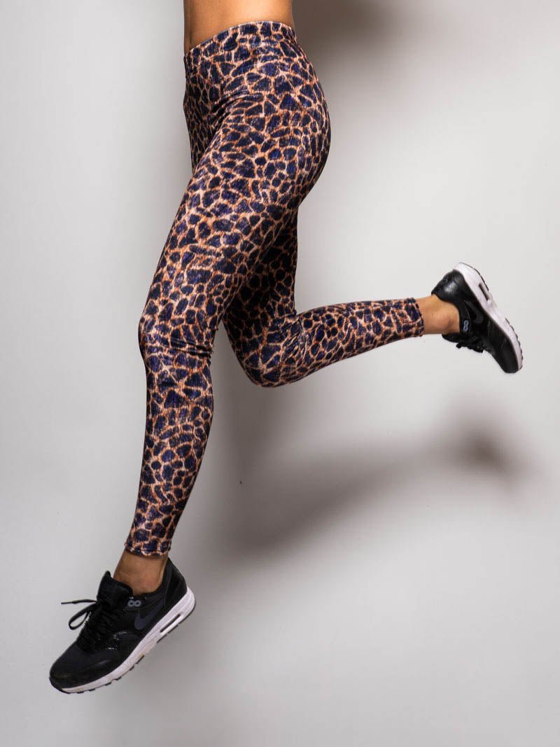 Side View of Purple Cheetah Velvet Leggings on Woman