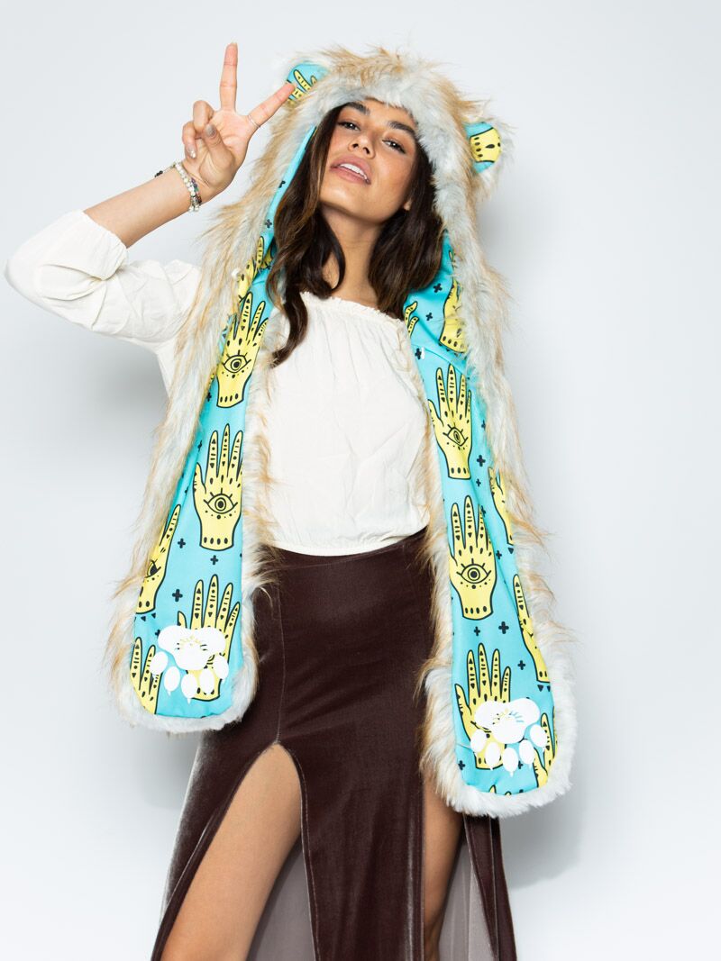 Woman wearing faux fur Golden Hamsa Bear Collector Edition SpiritHood