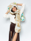 Woman wearing faux fur Golden Hamsa Bear Collector Edition SpiritHood, front view 1