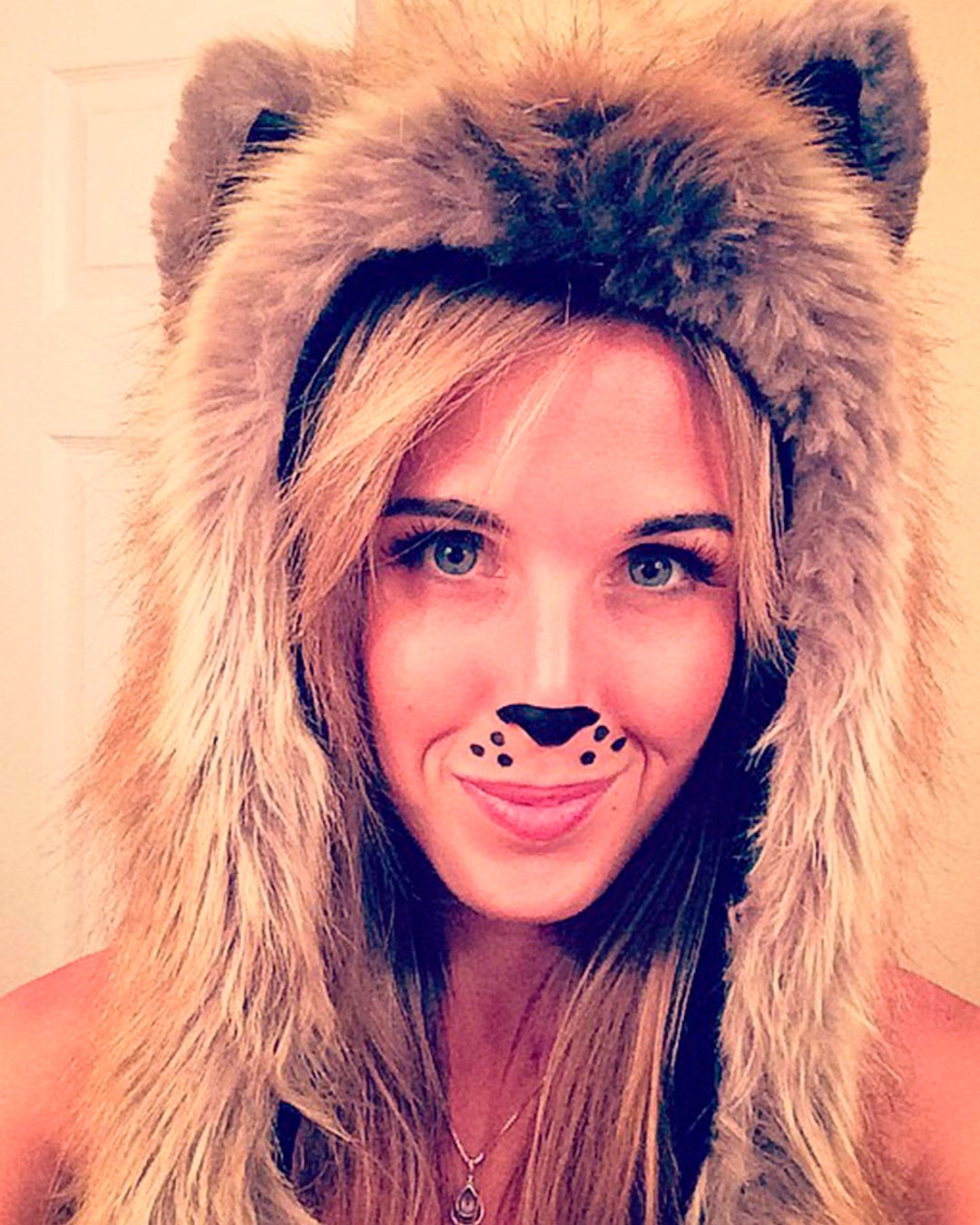 A Woman wearing SpiritHoods Red Fox Faux Fur Hood with painted black nose and whiskers. Easy Halloween Costume Ideas for Women. Halloween Outfits and Halloween Costumes.