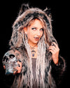 Women wearing white contact lenses, and halloween costume vampire fangs, holding a fake skull, wearing SpiritHoods Classic Grey Wolf Coat with the hood on showing distinct wolf ears. Easy Halloween Costume and Halloween Outfit Ideas in SpiritHoods Fake Fur Jackets