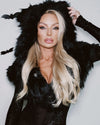 A Woman wearing SpiritHoods Best Selling Black Snakeskin Burnout Velvet Sheer Bodysuit paired with a SpiritHoods Shawl - Easy Halloween Outfits - Animal Themed Halloween Costumes