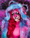 Woman with Lisa Frank Colorful Pink Tiger Face Paint wearing SpiritHoods Cotton Candy Bear Fake Fur Jacket, and hot pink hair against a starry space background. Animal-themed Halloween Costume. Halloween Outfits. Halloween Make up.