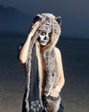 A Woman with skull make up painted on her face, wearing SpiritHoods Grey Wolf Fake Fur Hood with her hand inside one of the paws. Easy Halloween Make Up Halloween Costume Ideas