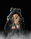 Woman wearing SpiritHoods Classic Grey Wolf Coat with fog coming up at the bottom, featuring easy halloween costume ideas with fake blood on one side of her mouth and red eyeshadow. SpiritHoods Halloween Costumes and Outfits