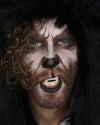 A Man with his face painted to resemble a wolf, snarling at the camera showing halloween wolf fangs, wearing SpiritHoods Black Wolf Classic Fake Fur Jacket with the hoop up