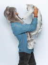 Man wearing faux fur Koala Collector Edition SpiritHood, side view 2