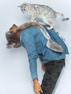 Man wearing faux fur Koala Collector Edition SpiritHood, side view