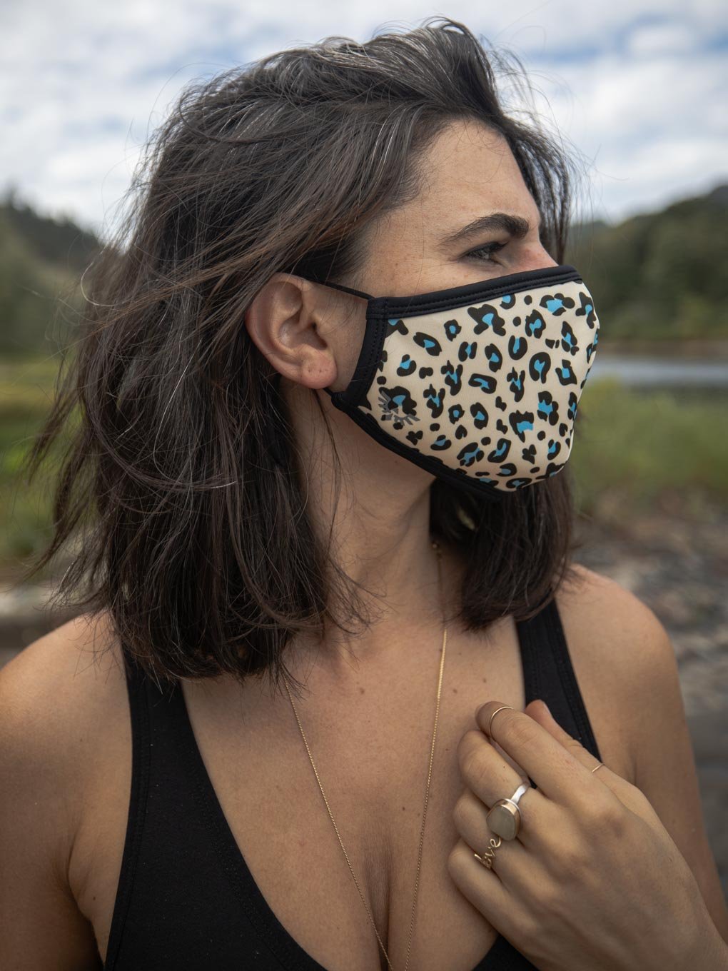 Woman wearing Blue Spotted Leopard Copper-Threaded Face Mask
