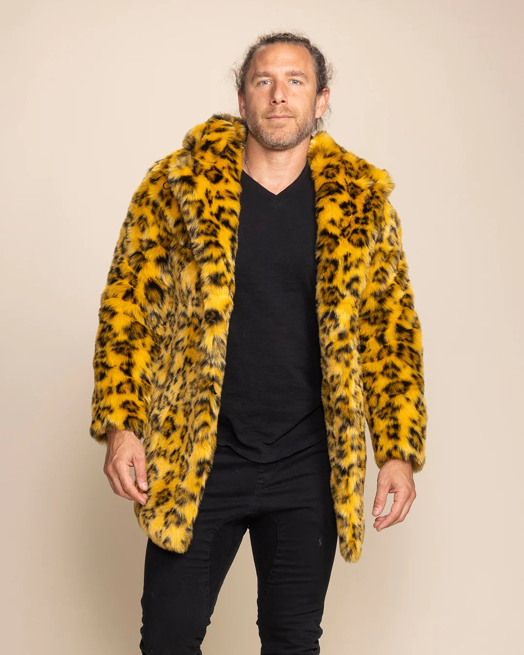 Unisex yellow cheetah print fake fur festival coat in a relaxed fit, ideal for festivals and music events.