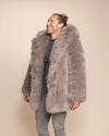 Unisex Grey Fox fake fur festival jacket with 4 functional pockets and a warm, oversized hood.