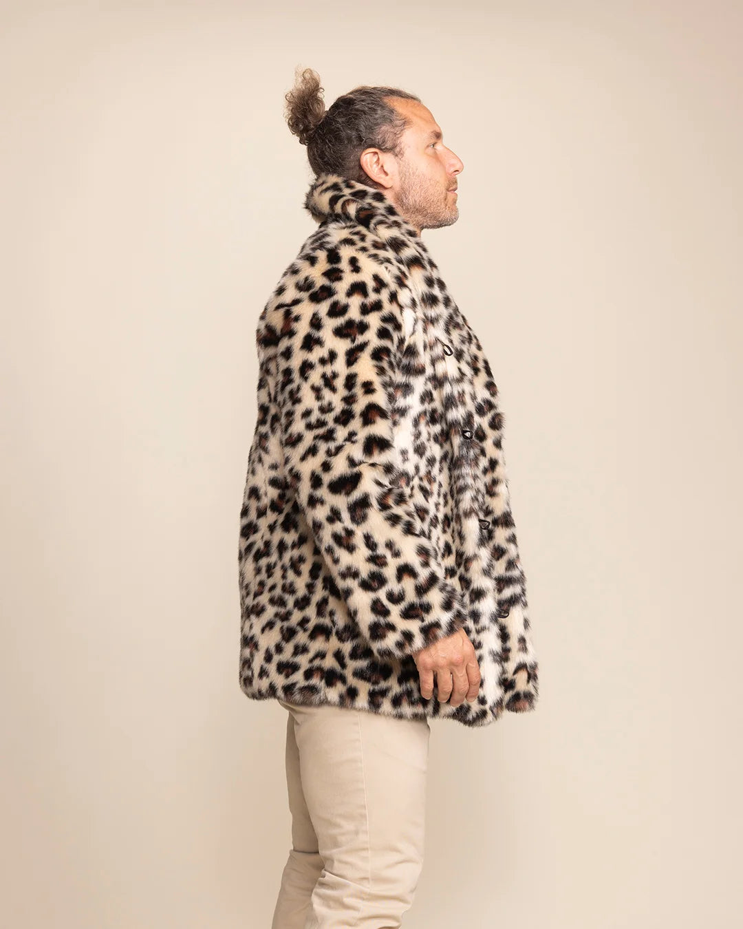 Side view of the men's Oncilla collared leopard coat by SpiritHoods, highlighting the detailed print and texture.