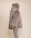 Versatile unisex Grey Fox limited production run faux fur layering piece with 4 pockets and an oversized hood.