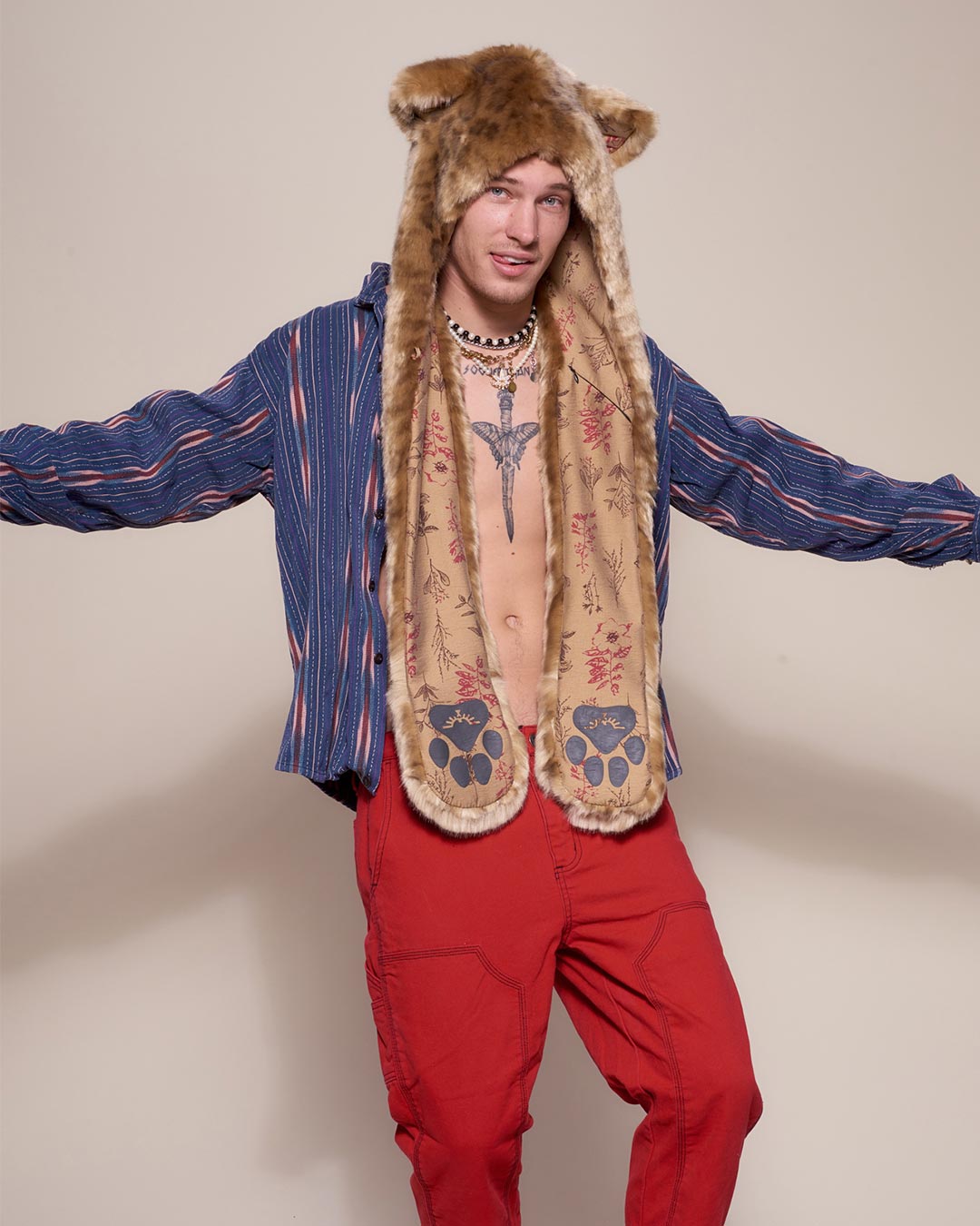 Man wearing African Golden Cat Luxe Faux Fur Collector Edition Hood, front view 1