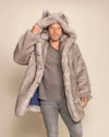 Oversized men's festival fur coat in Arctic Wolf style with a deep hood and peacoat button closure.