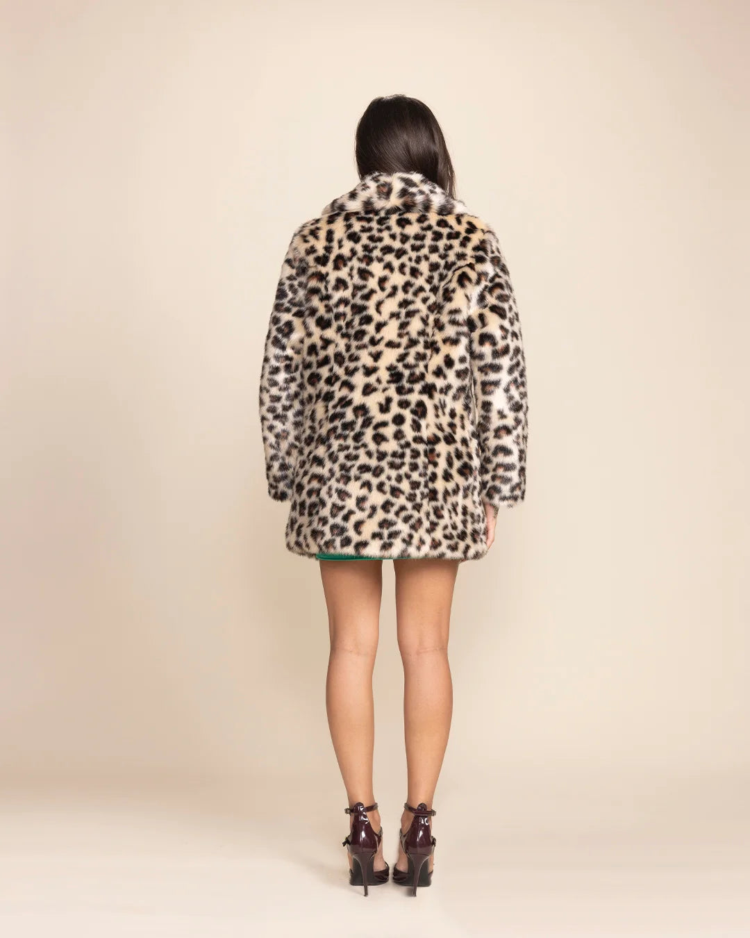 Trending animal print streetwear for women: the Oncilla faux fur jacket with a high collar and deep pockets.