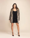 Exclusive women's cheetah print vegan fur coat with 4 deep functional pockets and a limited production run.