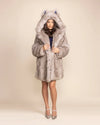 Unisex animal-inspired fashion: the Arctic Wolf faux fur parka with signature wolf-ears and oversized hood.