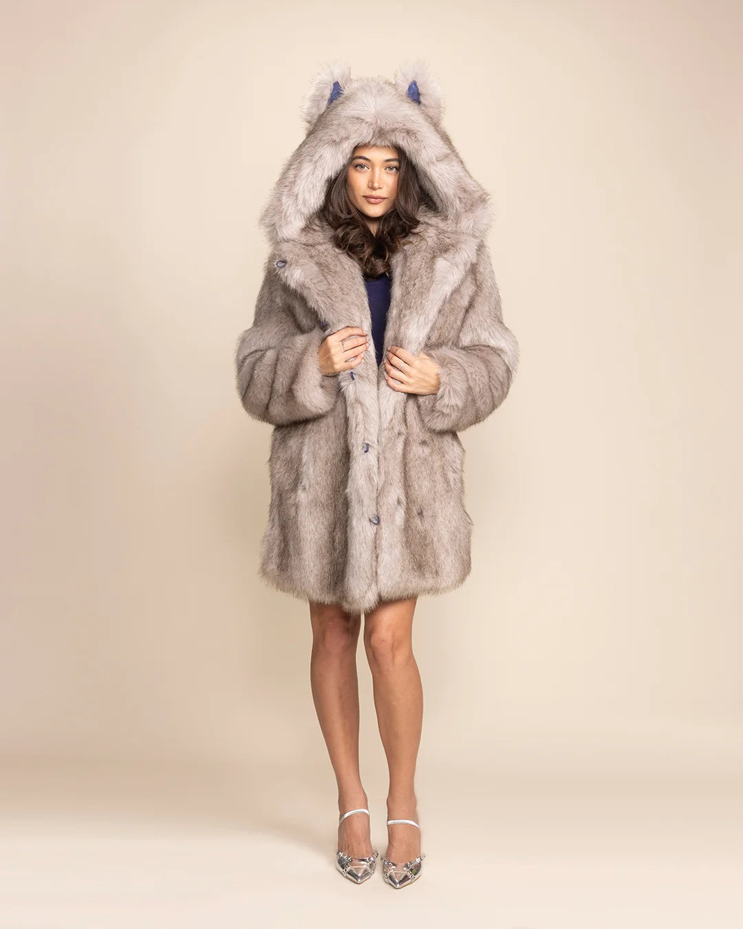 Unisex animal-inspired fashion: the Arctic Wolf faux fur parka with signature wolf-ears and oversized hood.