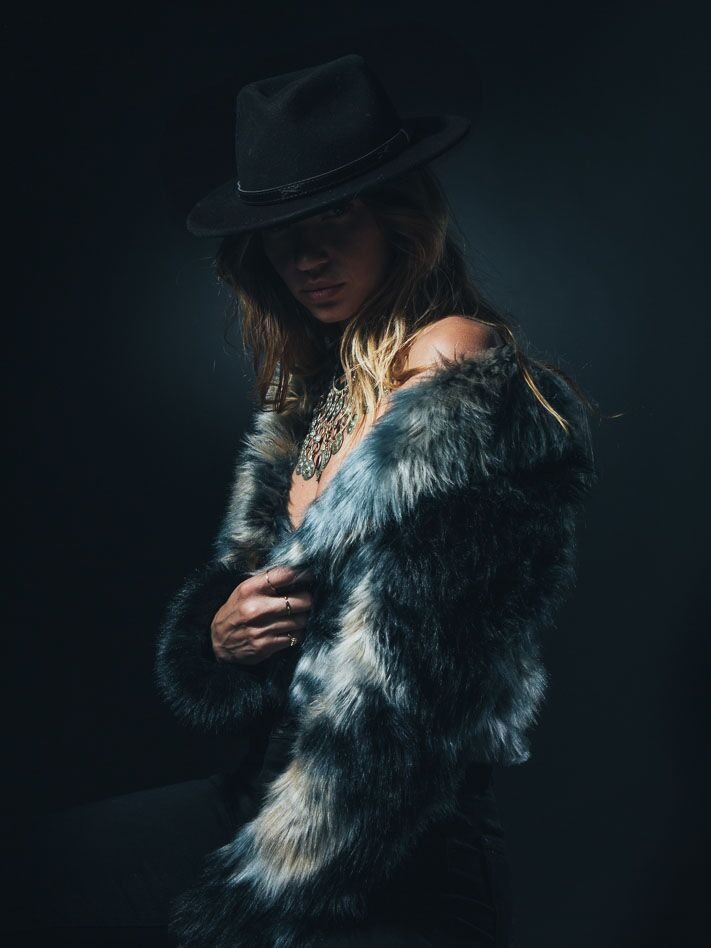 Woman Wearing Marble Fox Faux Fur Bomber SpiritHood 