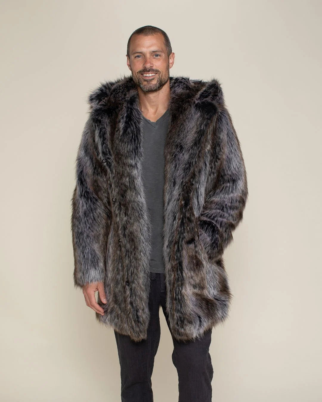 Man with hands in pockets wearing Grey Wolf Faux Fur Coat with Hood and Ears.