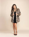 Relaxed fit Womens leopard fake fur jacket with peacoat button closure and four deep pockets. Top-rated festival fashion brand.