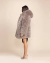Side view of a woman in the Grey Fox hooded coat by SpiritHoods.