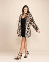 Relaxed fit women's leopard fur peacoat featuring a 100% vegan construction and custom logo button closure.