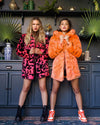 Woman wearing Neon Tiger Limited Edition Classic Faux Fur Coat, front view 3