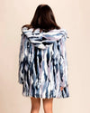 Model back view of SpiritHoods Lucky Rabbit Faux Fur Coat with the hood down, and coat open and flowing. 100% Fake Fur, cruelty-free, vegan fashion