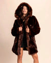 Women's brown faux fur coat with oversized hood by SpiritHoods. Vegan, cruelty-free fall winter layering & festival style in luxe fake fur.