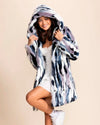 Top-rated luxury vegan fake fur jacket styles with a white mini dress, perfect Faux Fur Coats for festivals and fall-winter layering