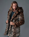 Man wearing a SpiritHoods best selling leopard print coat against a gray background. 100% Fake Fur Jackets Custom Made to Order - Limited Waste Faux Fur Coats and Animal Print Layers