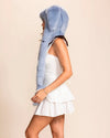 Side view of SpiritHoods Blue Rabbit Hood in plush fake fur with long bunny ears and scarf paws. Festival and rave-ready faux fur hood with pocket.