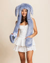 SpiritHoods women’s Collector Edition Rabbit Hood in blue fake fur with long scarf paws, stash pocket, and bunny ears. Original animal hood festival apparel.